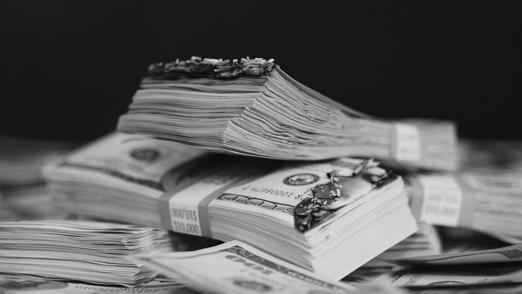Close-up stack of printed financial documents